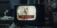 a tv with the words too violent on it
